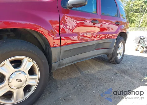 2003 Ford Escape Xlt z USA, uszkodzony, nr VIN 1FMYU93143KC64942